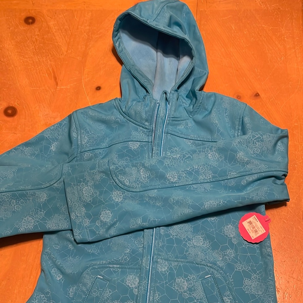 NWT girl’s SO size large turquoise, fleece lined wind breaker